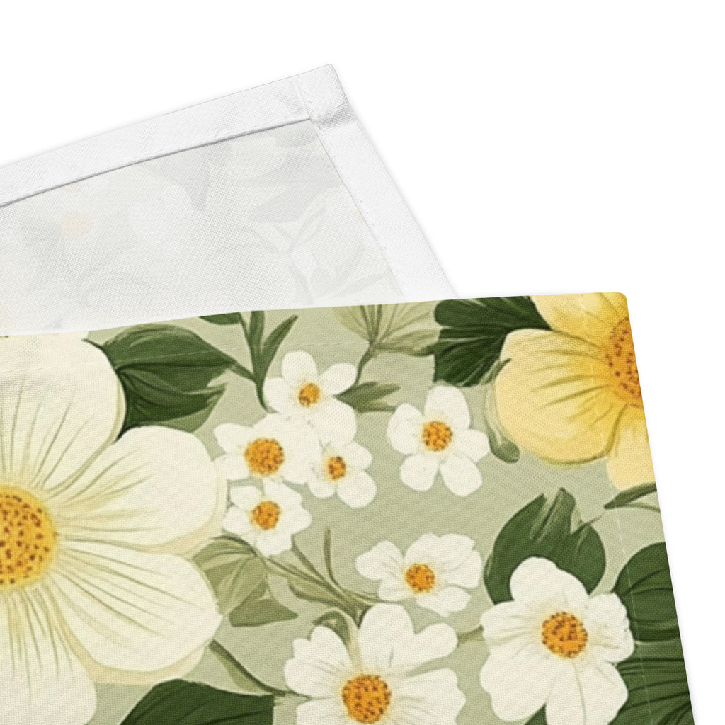 Floral patterned paper with white flowers and green leaves on a light green background