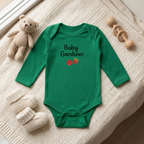 Green Raspberry onesie styled flat lay