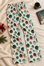 Holiday pajama pants styled with cozy props