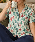 Leafy Dreams women's short sleeve pajama top while relaxing with tea