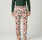 Different unique adult male model showing the full Christmas Tree pajama pants and pocketless front in close up