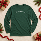 Forest green Merry Christmas long sleeve tee flat lay with wrapped gifts and red ribbon