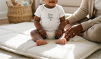 White Grow a Little Cheer baby onesie lifestyle image
