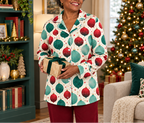 Holiday pajama top with burgundy red pants holding present