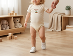 Natural cream Lil Carrot New to the Patch onesie lifestyle image
