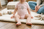Pink Grow a Little Cheer baby onesie lifestyle image
