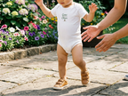 White Grow a Little Cheer baby onesie toddler lifestyle image
