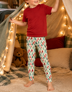 Boy in Leafy Dreams leggings building a blanket fort