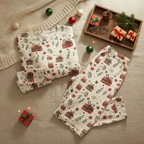 Christmas Present men’s pajama top and pocket-free pants with warm lights, ornaments, gifts, and cocoa