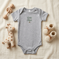 Athletic Heather Grow a Little Cheer baby onesie accessory flat lay