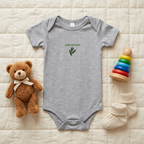 Gray Baby Bay Leaf onesie styled as a flat lay with baby accessories.