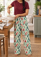 Leafy Dreams women's pajama pants mixing batter in the kitchen