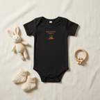 Black Lil Carrot New to the Patch short-sleeve onesie styled with baby accessories