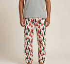 Unique adult male model showing the full Christmas Tree pajama pants from waistband to ankles in close up