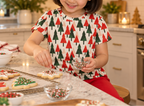 Child in Christmas Tree kids pajama top decorating sugar cookies
