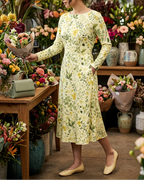 Yellow floral midi dress worn while choosing flowers