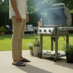 Person grilling outdoors with a barbecue in a garden setting
