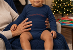 New baby boy in Navy, Christmas storytime setting