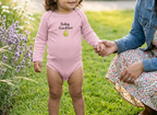 Pink Pear onesie, toddler with mother in flower garden