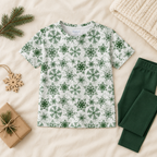 Green snowflake kids pajama top styled with plain green leggings and holiday accessories; leggings sold separately