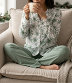 Relaxed cross-legged mug scene using the supplied pose reference