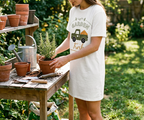 Repotting rosemary wearing the Garden Fresh dress without layers