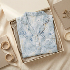 Soft blue floral pajama top with white trim folded square in cream gift box