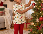 Tree decorating scene with red leggings