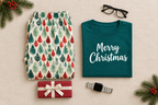 Wider Leafy Dreams flat lay with a polished stainless-steel smartwatch, glasses, and Christmas present